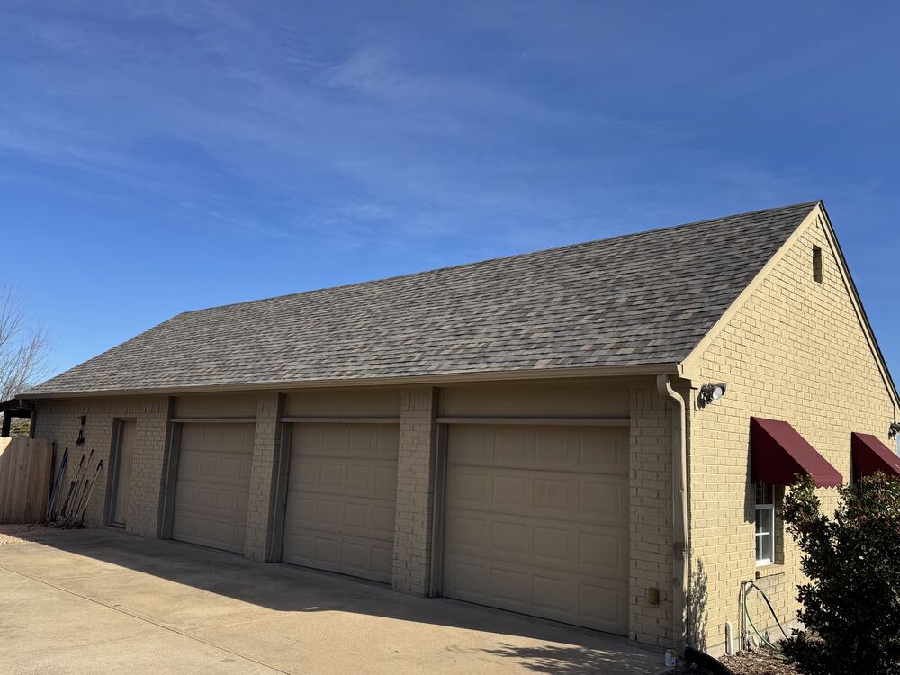 Completed roof over three-car garage