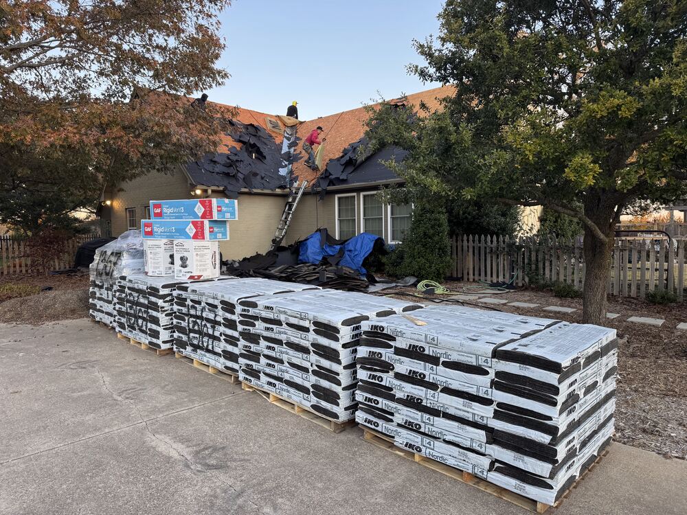 Stacked shingle bundles delivered to job site
